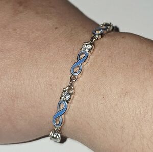 Elegant Silver and Blue Infinity Bracelet